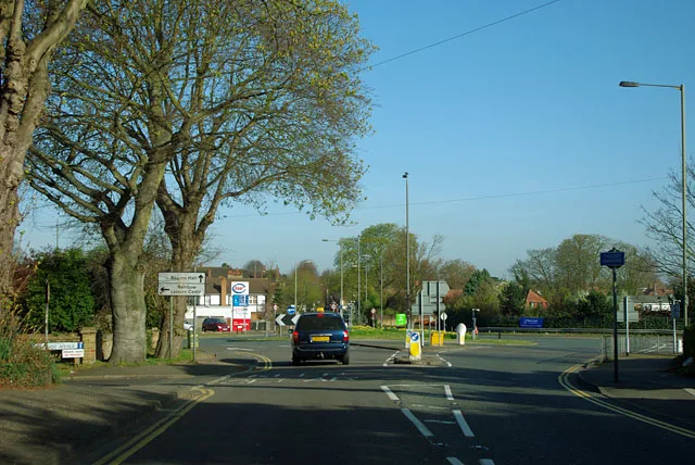 The A24 and A240 roundabout on the Ewell Bypass, beside the former Homebase site. The photo was taken before the store closed and does not show the building